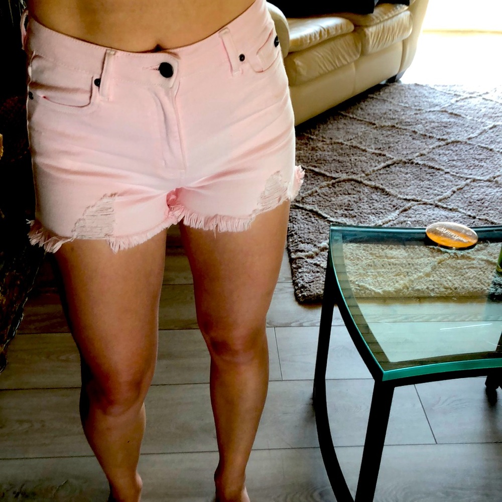 Blush shorts, perfect for the beach with a cute crop.